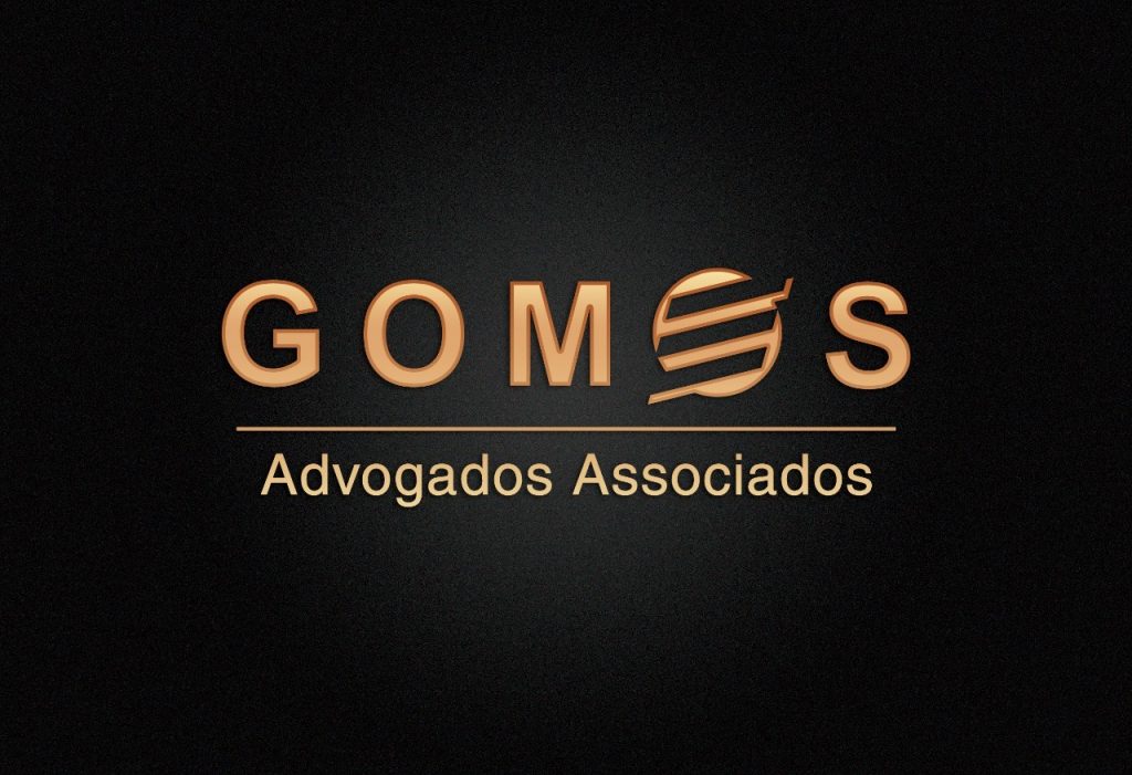 Usucapião Gomes Advogados Associados com sede em São Francisco do Sul (SC) em letras de cor laranja e fundo preto